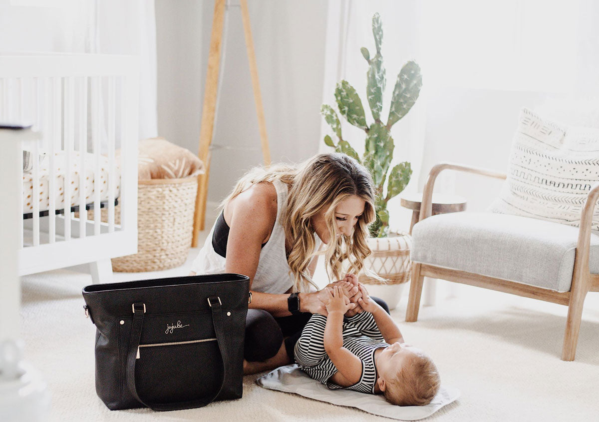 Woman plays with child