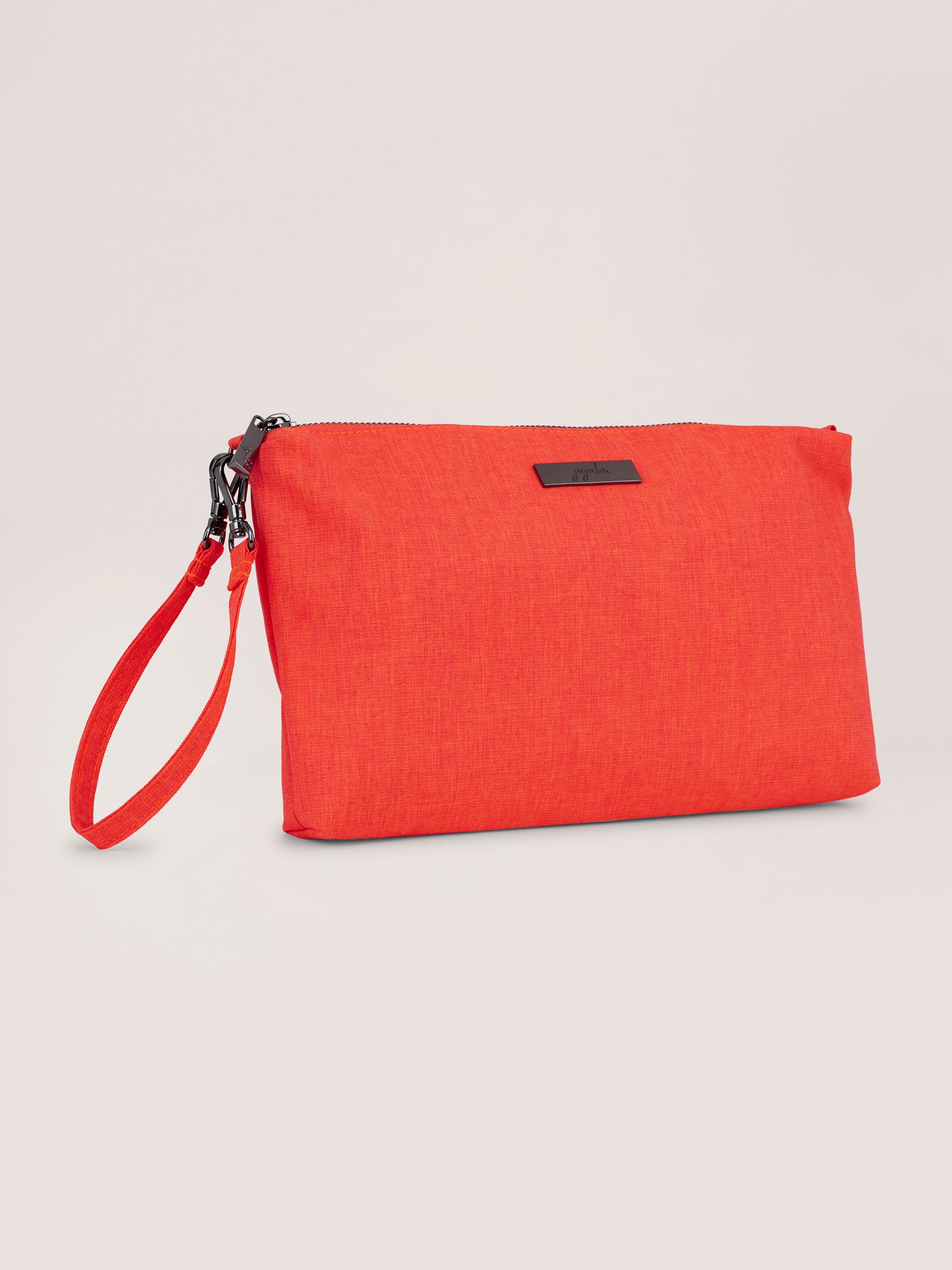 Neon Coral Pink Be Quick Quarter Angle View with Wristlet Strap