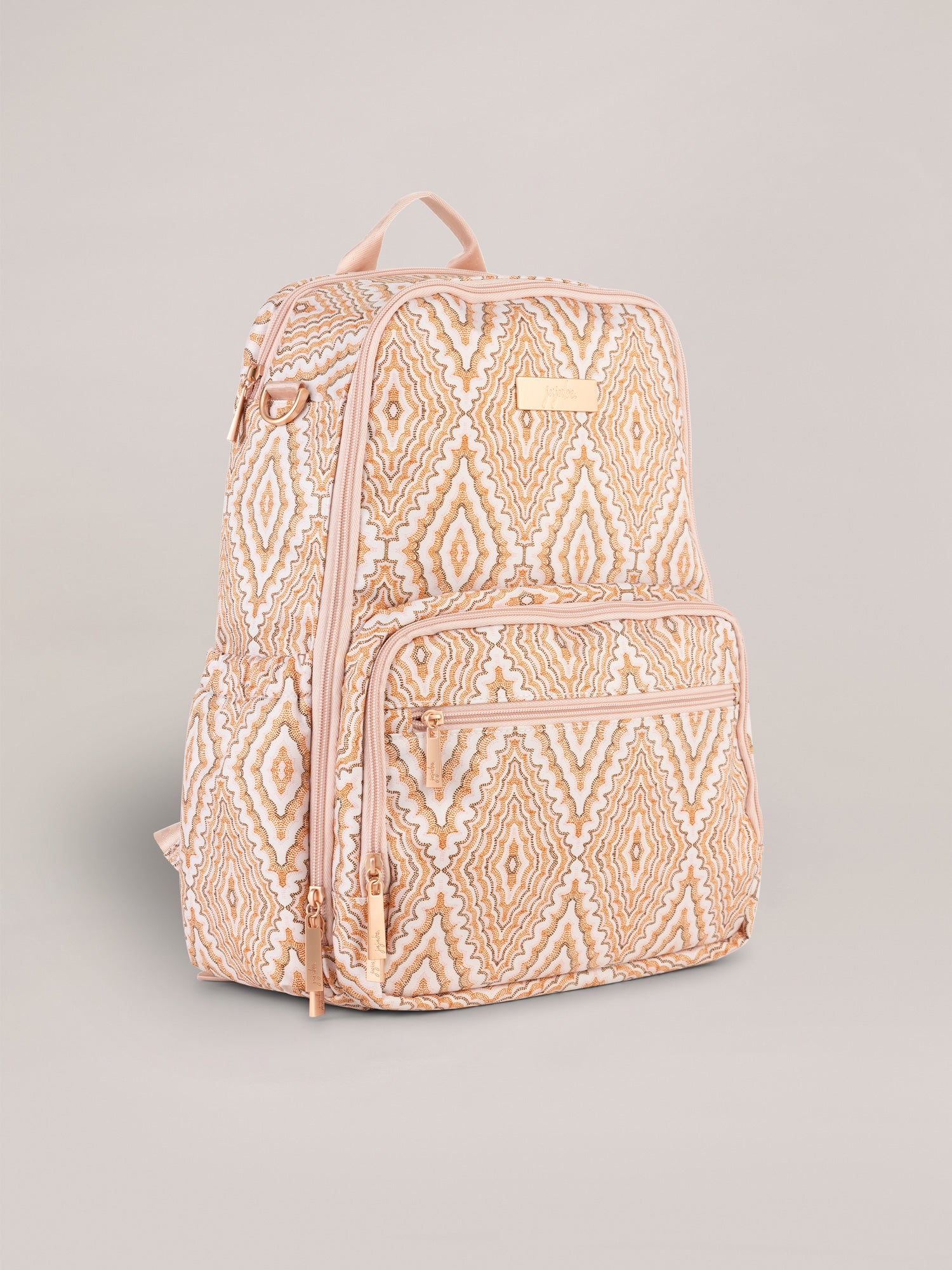 Pink, Orange and Brown Dotted Diamond Pattern Zealous Backpack Diaper Bag Three Quarter Angle View