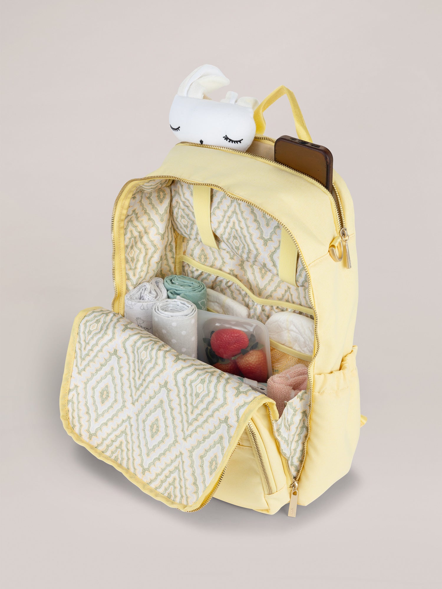Light Yellow Zealous Backpack Diaper Bag Quarter Angle Open View Packed