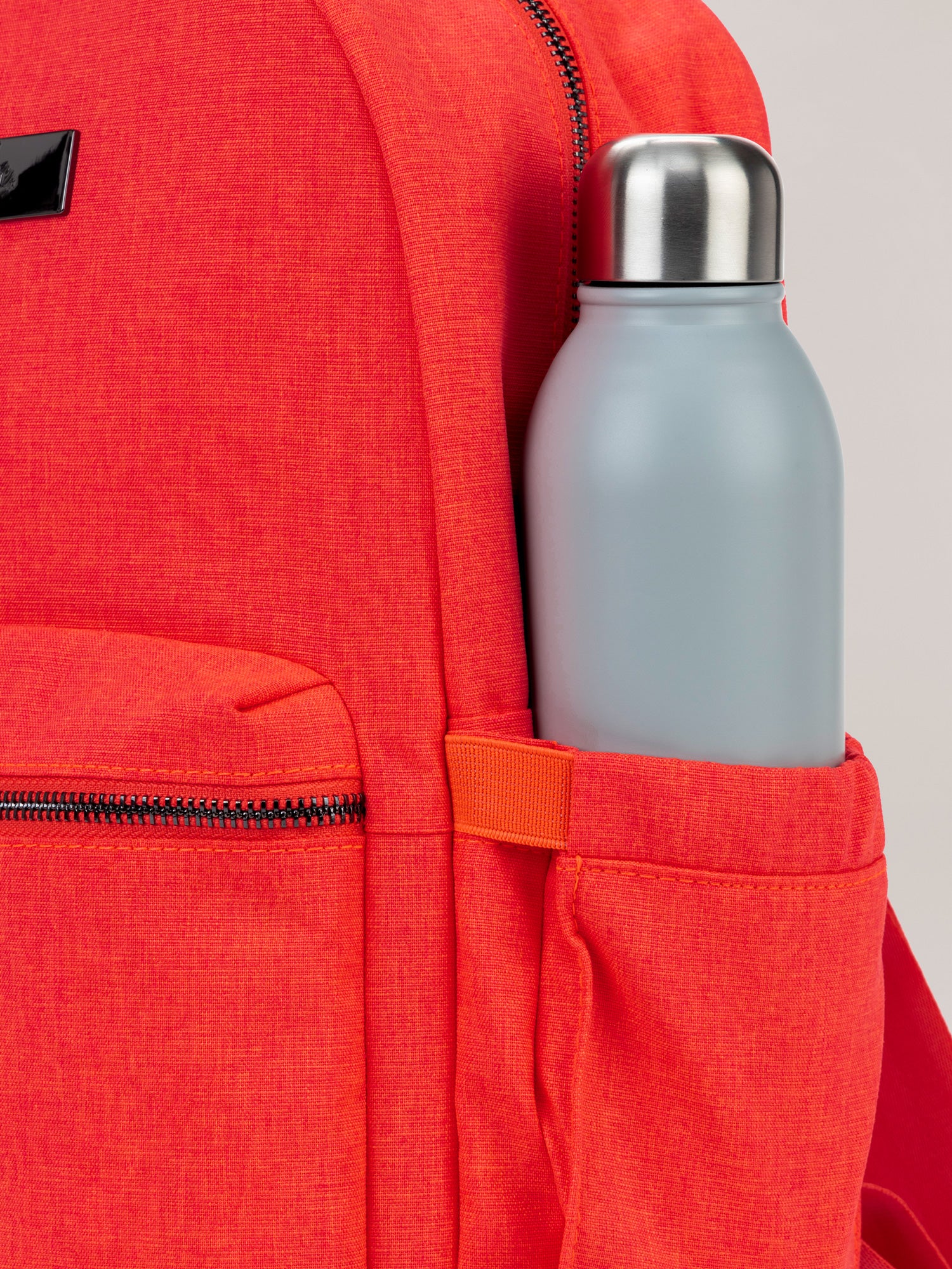 Neon Coral Pink Midi Backpack Bottle Pocket Detail View