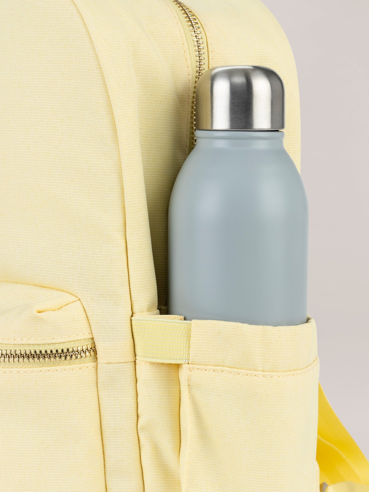 Light Yellow Midi Backpack Detail Bottle Pocket View