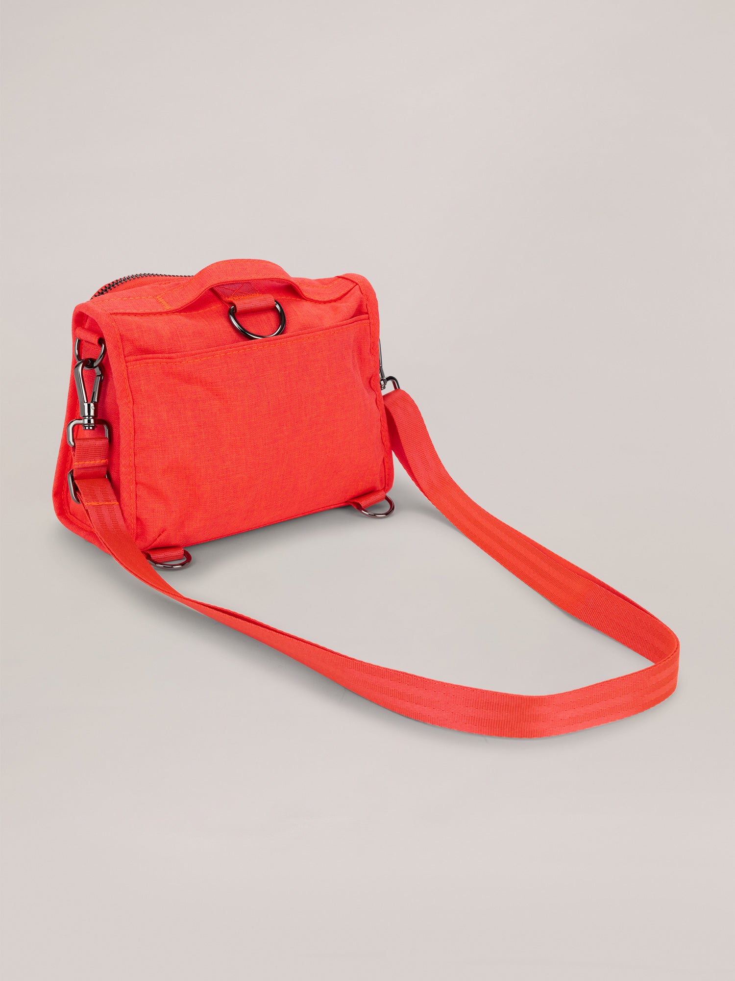 Neon Coral Pink Mini B.F.F. Crossbody Bag Quarter Angle Back View with Strap