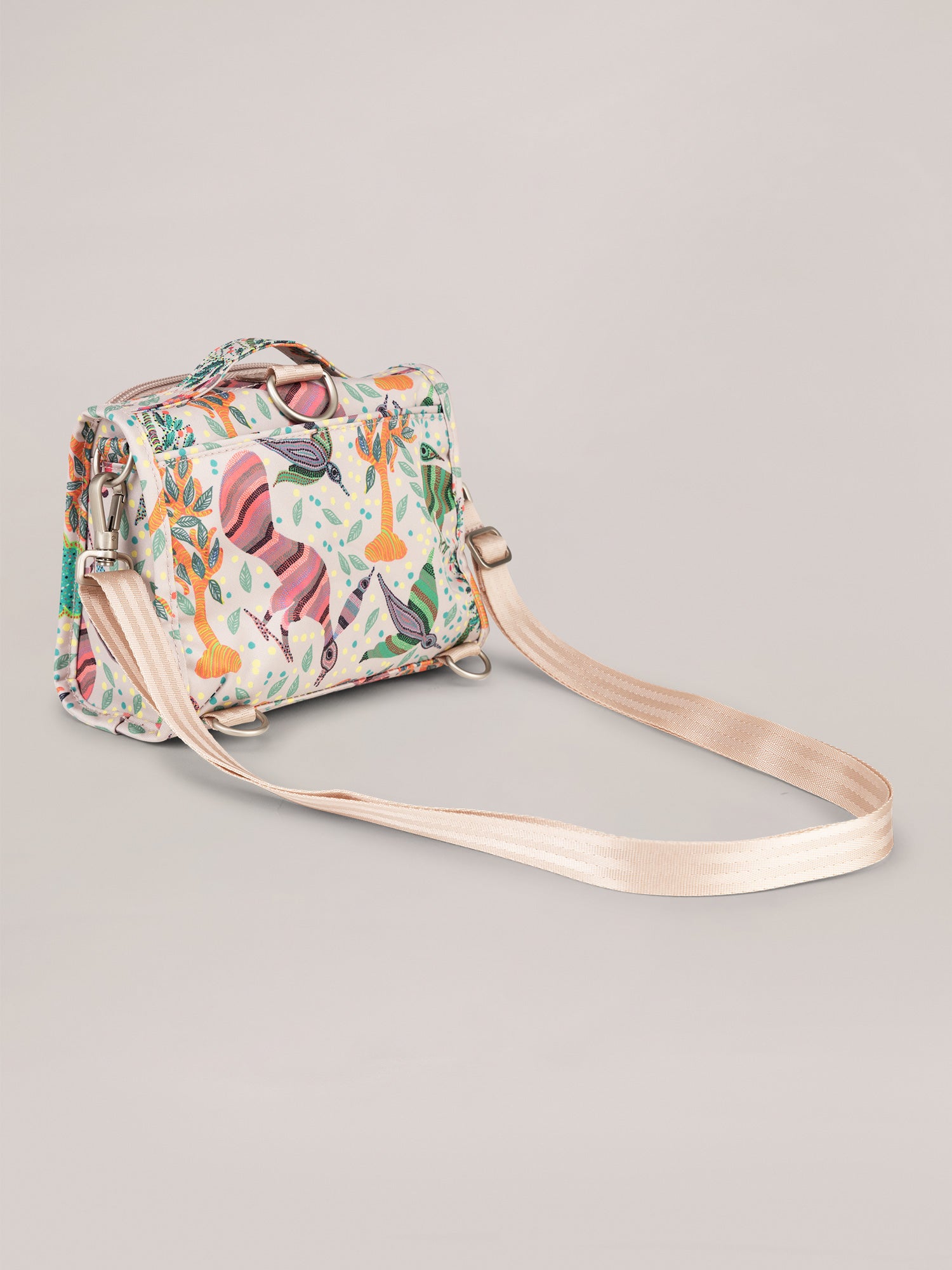 Multicolor Animals, Birds and Trees on a Taupe Background Mini B.F.F. Crossbody Bag Three Quarter Angle Back View with Strap