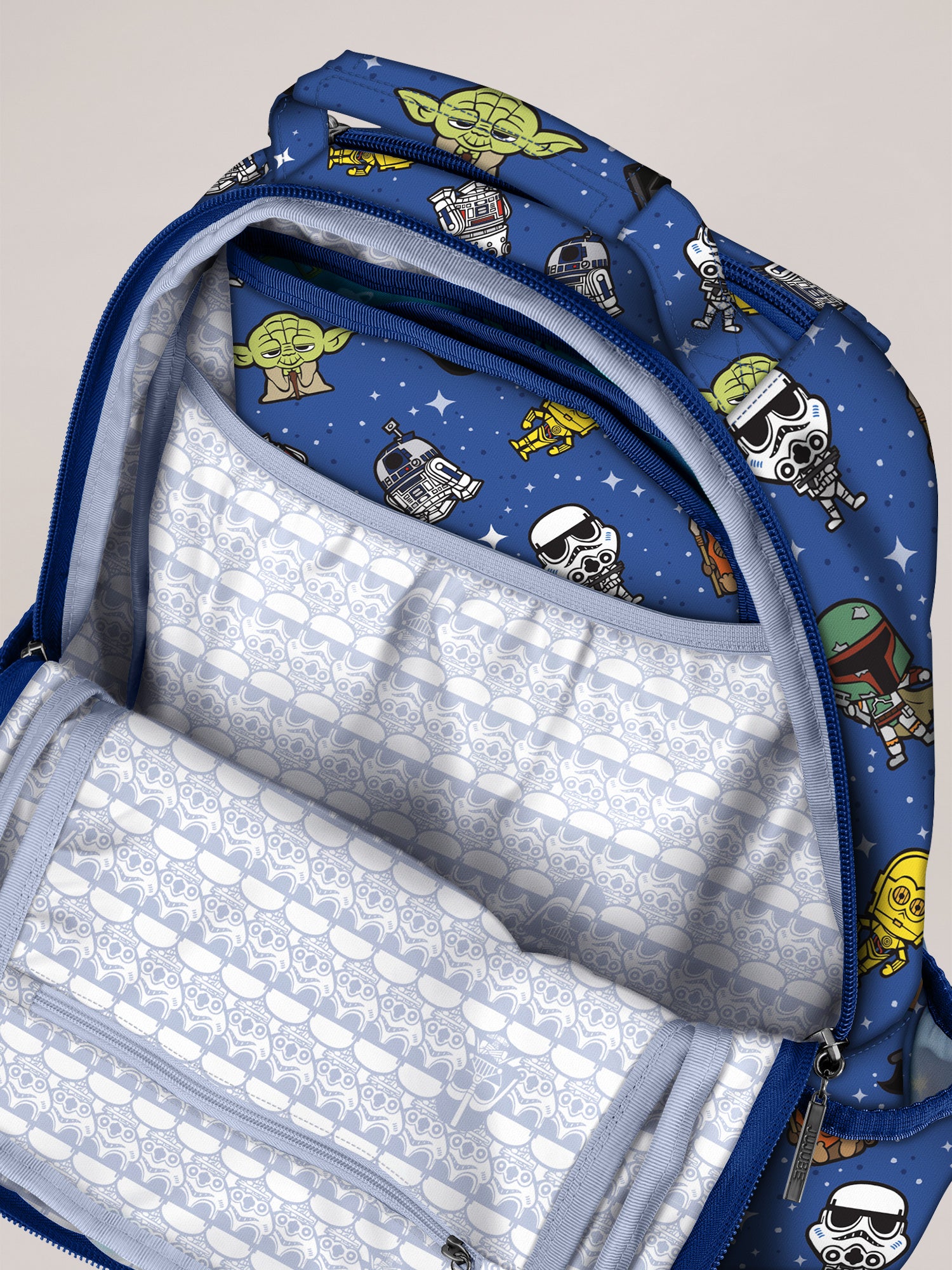 Image with a pattern of adorable STAR WARS characters traveling through a galaxy of stars