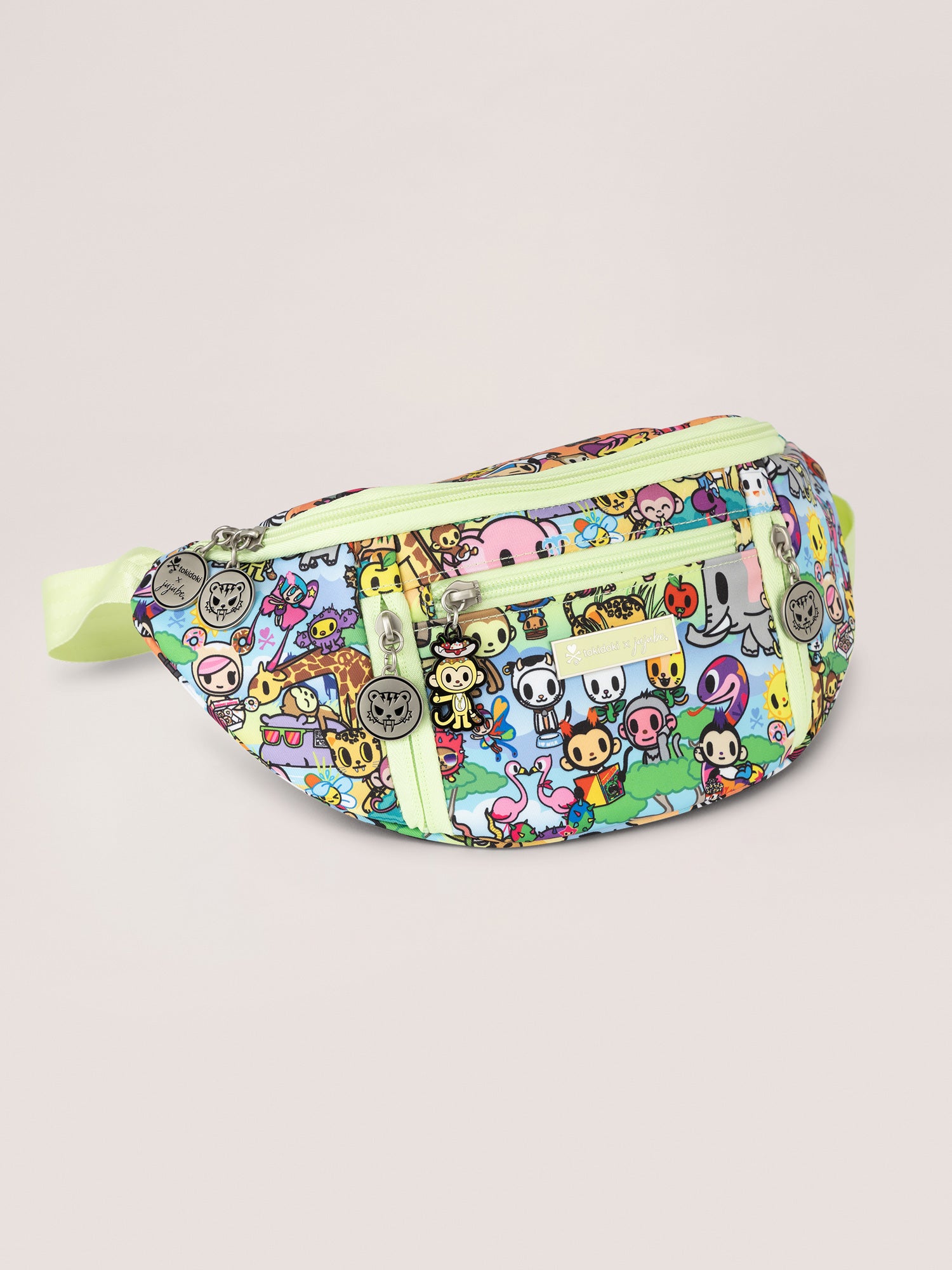 Ombre Blues, Greens and Oranges in the Background with tokidoki Characters in a Photo Safari Theme Sling Bag Crossbody Bag Quarter Angle View