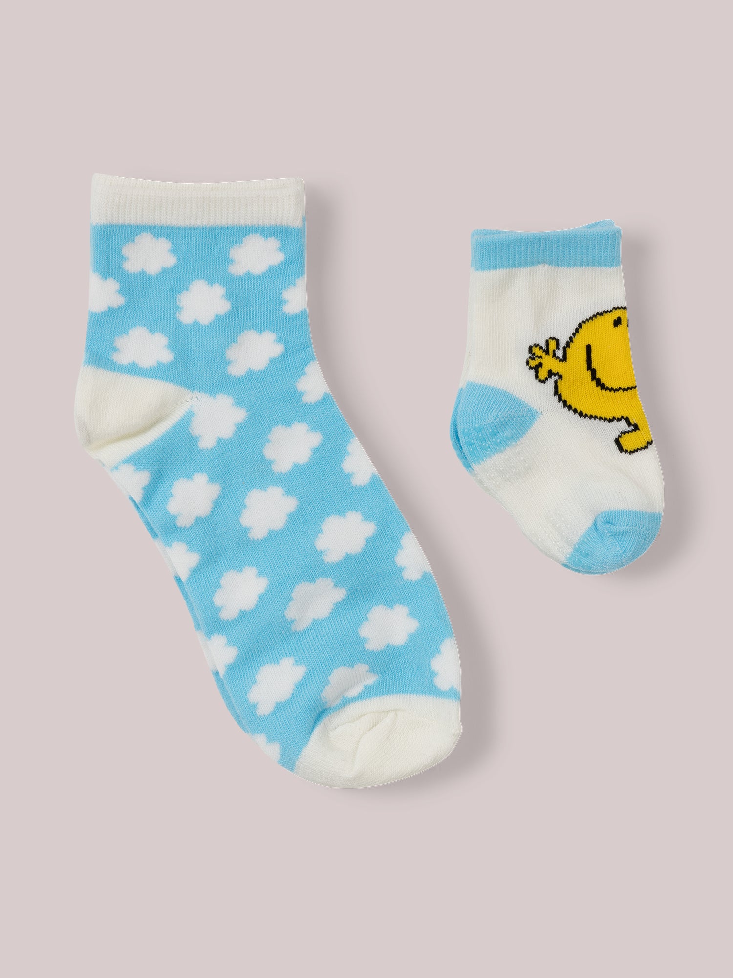 Mama and baby Mr. Happy socks flat lay