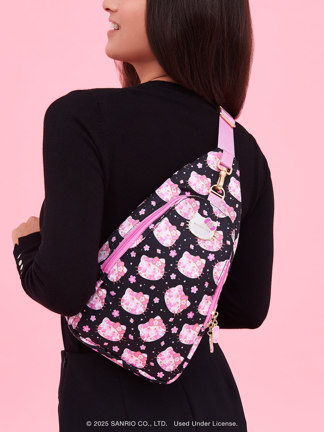 Hello Kitty® × JuJuBe Cherry Blossoms Crossbody Sling Diaper Bag — Black and Pink