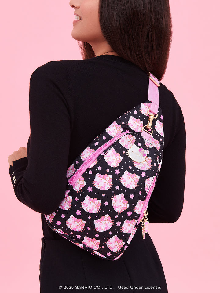 Hello Kitty® × JuJuBe Cherry Blossoms Crossbody Sling Diaper Bag — Black and Pink