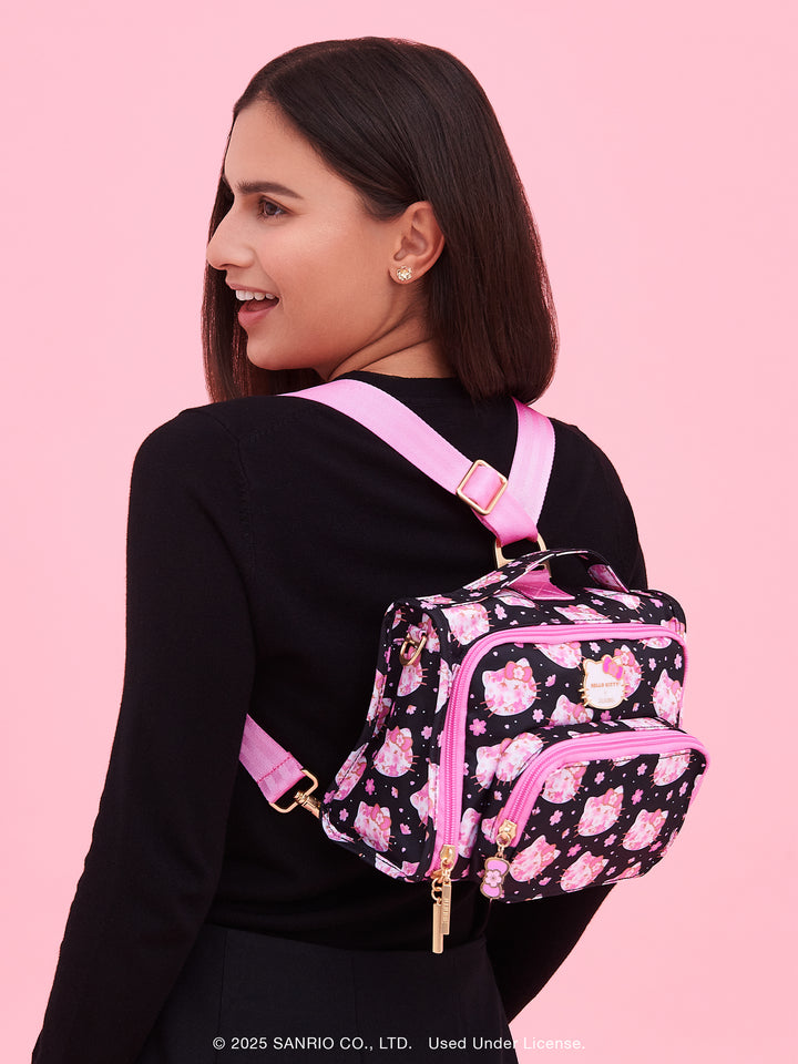Hello Kitty® × JuJuBe Cherry Blossoms Bestie Small Messenger Handbag, Backpack — Black and Pink