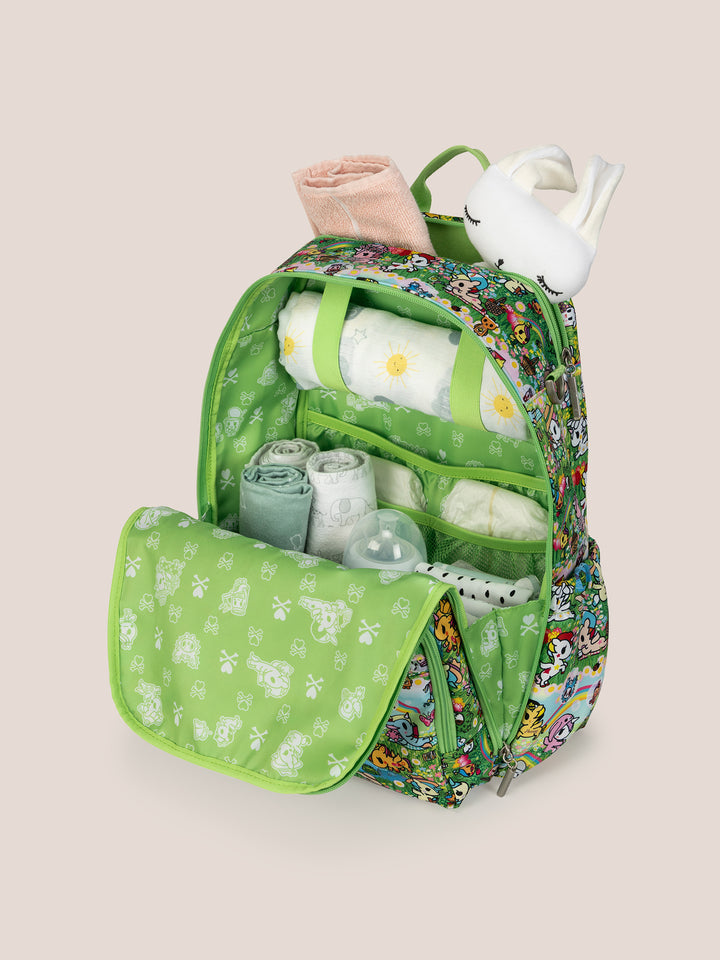 tokidoki x JuJuBe Zealous Diaper Bag Backpack in Meadow Blooms – detail view of interior storage compartments and the stowaway tech pocket