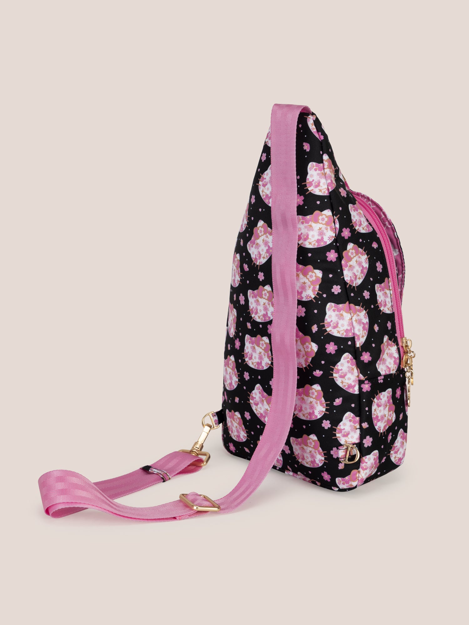 Hello Kitty® × JuJuBe Cherry Blossoms Crossbody Sling Diaper Bag — Black and Pink