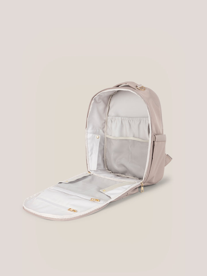 JuJuBe Classic Diaper Backpack in Taupe – front view with the main compartment open showing organized interior pockets and storage