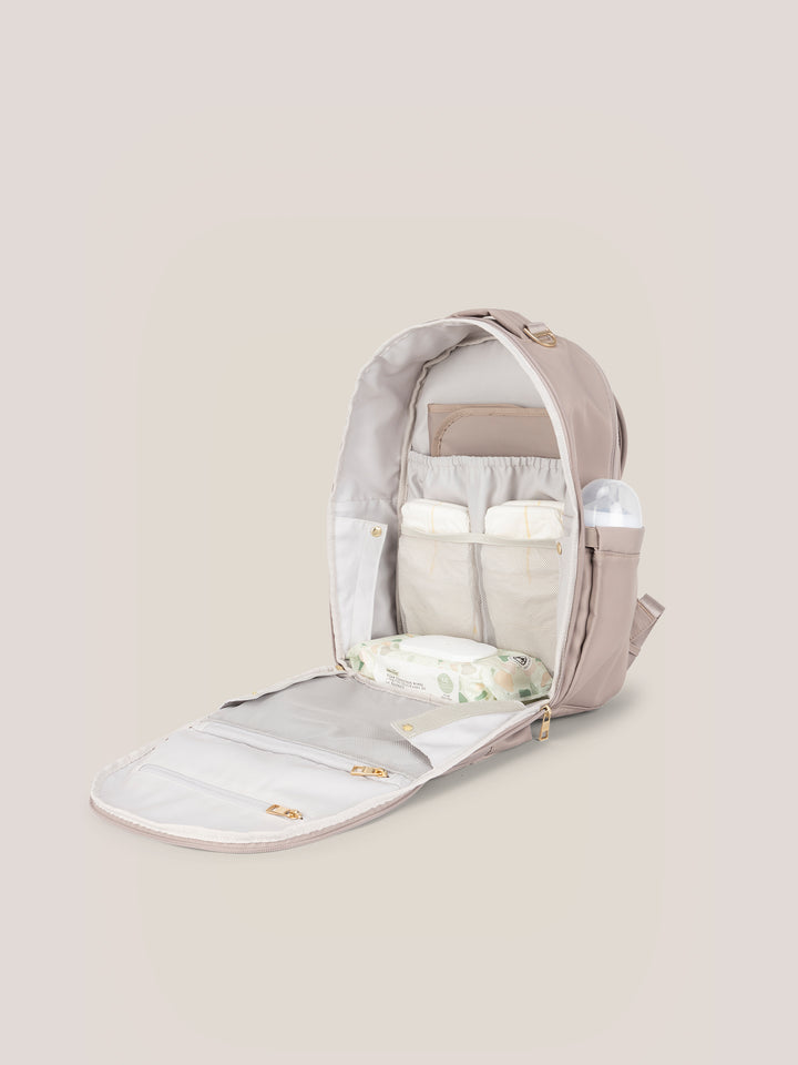 JuJuBe Classic Diaper Backpack in Taupe – back panel open to reveal the included cushioned changing pad